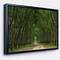 Designart - Pathway in Thick Green Forest - Landscape Photography Canvas Print in Black Frame